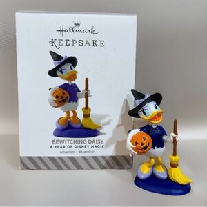 Hallmark Disney Bewitching Daisy Ornament NIB Keepsake